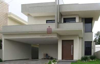 Imagem: A casa possui 2 Dormitórios, 3 Banheiros, 2 Vagas na garagem