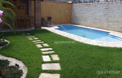 Imagem: A casa possui 3 Dormitórios, 3 Banheiros, 3 Vagas na garagem