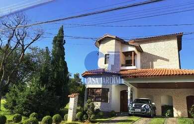 Imagem: A casa em condomínio possui 4 Dormitórios, 3 Banheiros, 2