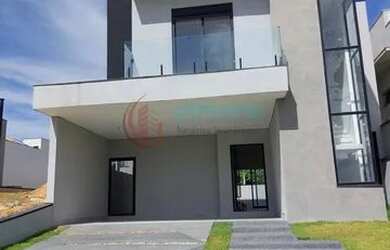 Imagem: A casa possui 3 Dormitórios, 5 Banheiros, 2 Vagas na garagem