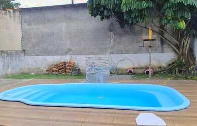 Imagem: A casa possui 4 Dormitórios, 3 Banheiros, 4 Vagas na garagem