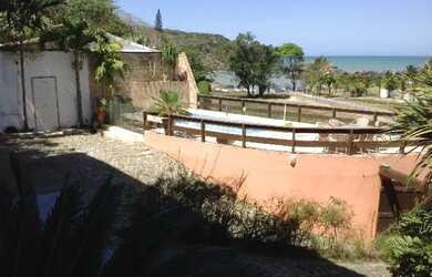 Imagem: A casa possui 5 Dormitórios, 5 Vagas na garagem e está localizado