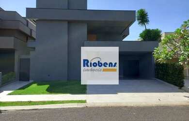 Imagem: A casa em condomínio possui 4 Dormitórios, 5 Banheiros, 295m²