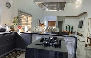 Imagem 9: Venda Casa com 220,00 metroQuadrado, 3 dormitório s , 4 vaga s . Swiss...