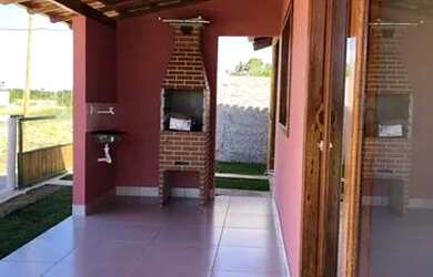 Imagem: A casa possui 2 Dormitórios, 2 Banheiros, 1 Vaga na garagem