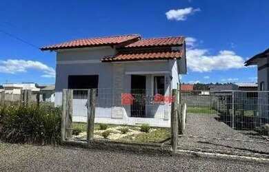 Imagem: A casa à venda possui 2 Dormitórios, 1 Banheiro, 1 Vaga na