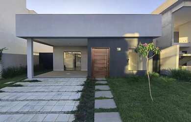 Imagem 2: COND. ALPHAVILLE - VENDO OU TROCO CASA TÉRREA COM 3 SUÍTES, SALA AMPLA E ESPAÇO PARA ÁREA