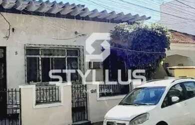 Imagem: A casa possui 3 Dormitórios, 2 Banheiros, 4 Vagas na garagem