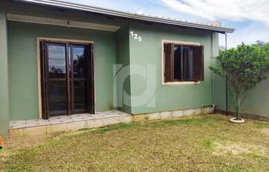 Imagem: A casa possui 2 Dormitórios, 1 Banheiro, 2 Vagas na garagem