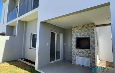 Imagem: A casa possui 3 Dormitórios, 3 Banheiros, 2 Vagas na garagem