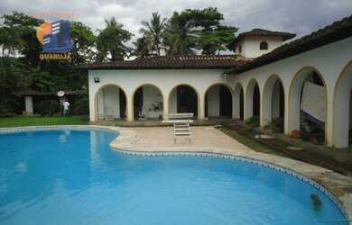 Imagem: A casa possui 3 Dormitórios, 3 Banheiros, 5 Vagas na garagem