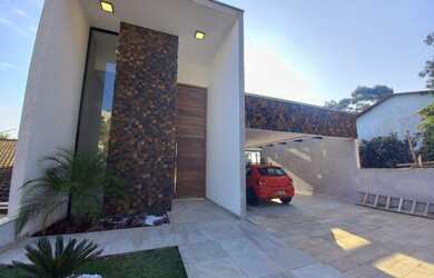 Imagem: A casa em condomínio possui 4 Dormitórios, 5 Banheiros, 4