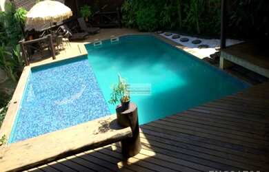 Imagem: A casa possui 5 Dormitórios, 5 Banheiros, 396m² de Área e