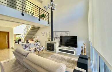 Imagem: A casa possui 3 Dormitórios, 5 Banheiros, 4 Vagas na garagem