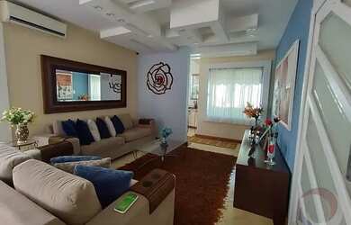 Imagem: A casa possui 3 Dormitórios, 4 Banheiros, 3 Vagas na garagem