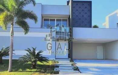 Imagem: A casa em condomínio possui 4 Dormitórios, 5 Banheiros, 5