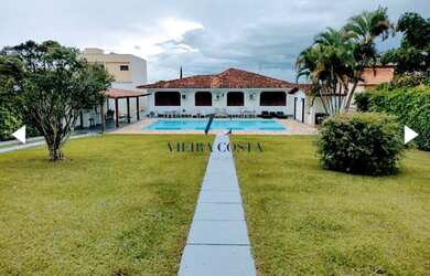 Imagem: A casa possui 5 Dormitórios, 5 Banheiros, 5 Vagas na garagem