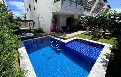 Imagem: A casa em condomínio e possui 5 Dormitórios, 5 Banheiros