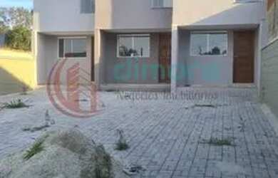 Imagem: A casa possui 2 Dormitórios, 3 Banheiros, 2 Vagas na garagem