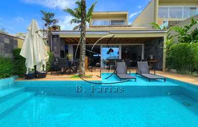 Imagem: A casa em condomínio possui 4 Dormitórios, 5 Banheiros, 2