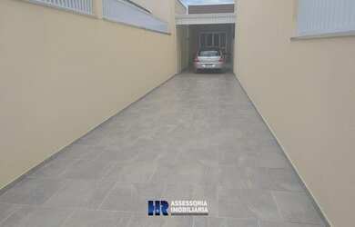 Imagem: A casa possui 2 Dormitórios, 3 Banheiros, 4 Vagas na garagem