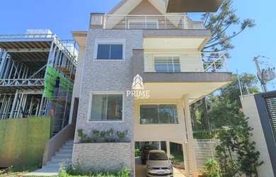 Imagem: A casa em condomínio possui 4 Dormitórios, 5 Banheiros, 3