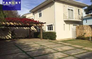 Imagem: A casa em condomínio possui 4 Dormitórios, 5 Banheiros, 5