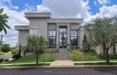 Imagem: A casa em condomínio à venda possui 4 Dormitórios, 5 Banheiros