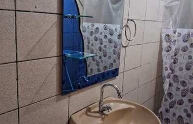 Imagem: A casa possui 2 Dormitórios, 2 Banheiros, 2 Vagas na garagem