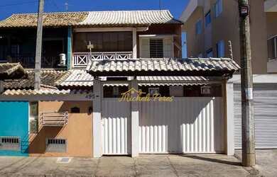 Imagem: A casa possui 3 Dormitórios, 2 Banheiros, 2 Vagas na garagem