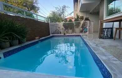 Imagem: A casa em condomínio possui 3 Dormitórios, 4 Banheiros, 2