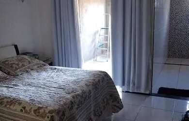 Imagem: A casa possui 3 Dormitórios, 3 Banheiros, 2 Vagas na garagem