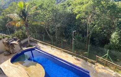 Imagem: A casa em condomínio possui 5 Dormitórios, 5 Banheiros, 5