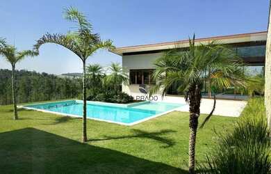 Imagem: A casa em condomínio possui 4 Dormitórios, 5 Banheiros, 3