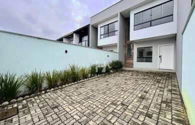 Imagem: A casa possui 3 Dormitórios, 1 Banheiro, 1 Vaga na garagem