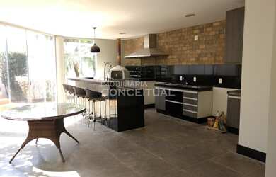 Imagem: A casa em condomínio possui 3 Dormitórios, 4 Banheiros, 2