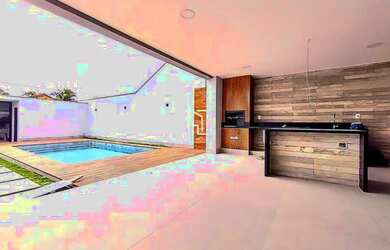 Imagem: A casa em condomínio possui 5 Dormitórios, 5 Banheiros, 2