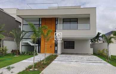 Imagem: A casa em condomínio possui 5 Dormitórios, 5 Banheiros, 2