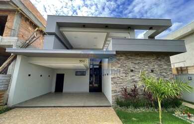 Imagem: A casa possui 3 Dormitórios, 5 Banheiros, 4 Vagas na garagem