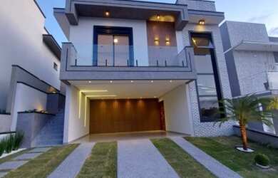 Imagem: A casa possui 3 Dormitórios, 4 Banheiros, 4 Vagas na garagem