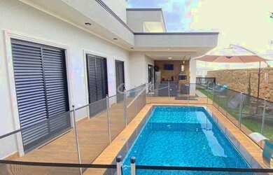 Imagem: A casa em condomínio possui 3 Dormitórios, 2 Banheiros, 4