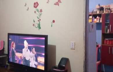 Imagem: A casa possui 3 Dormitórios, 2 Banheiros, 2 Vagas na garagem