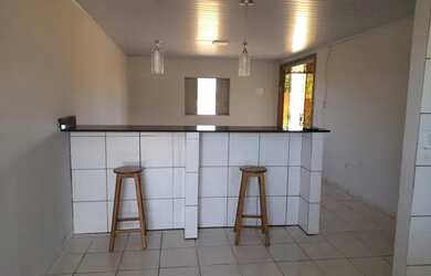 Imagem: A casa possui 2 Dormitórios, 1 Banheiro e está localizado