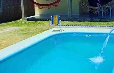 Imagem: A casa possui 3 Dormitórios, 3 Banheiros, 3 Vagas na garagem