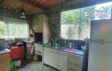 Imagem: A casa em condomínio possui 2 Dormitórios, 3 Banheiros, 5