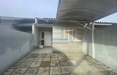 Imagem: A casa possui 2 Dormitórios, 1 Banheiro, 2 Vagas na garagem