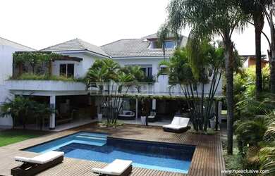 Imagem: A casa possui 5 Dormitórios, 5 Banheiros, 5 Vagas na garagem