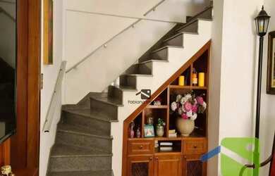 Imagem: A casa possui 3 Dormitórios, 2 Banheiros, 3 Vagas na garagem