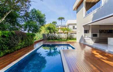 Imagem: A casa em condomínio possui 4 Dormitórios, 5 Banheiros, 3