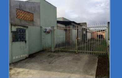 Imagem: A casa possui 2 Dormitórios, 1 Banheiro, 1 Vaga na garagem